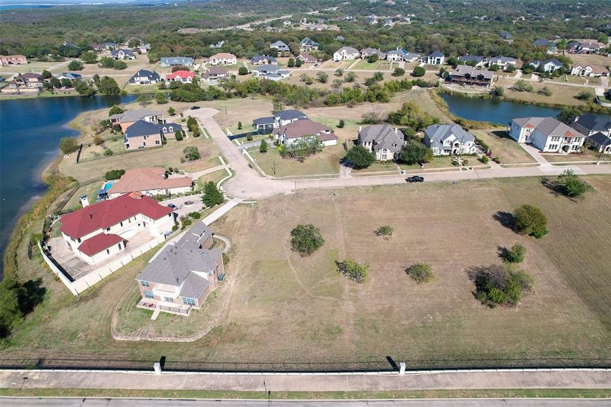 Build your dream home in the prestigious Lake Ridge Community. This scenic lot offers beautiful views and a peaceful setting near Joe Pool Lake, golf courses, dinning, and shopping, with easy access to Downtown Dallas and Fort Worth.