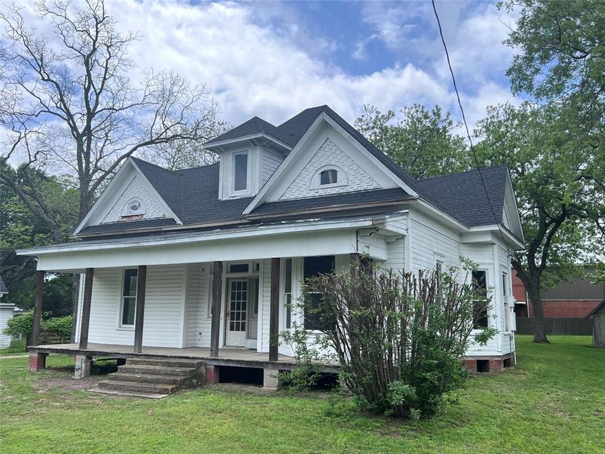 Investment Property in Blooming Grove. This historic home, built in 1915 is waiting for its new owner to come make into their dream house! Huge lot on main drive through the small town. Walking distance to schools, park, churches, library. Has recently been leveled, new 30 year composition roof, exterior wood repairs, and primer coat of exterior paint. Ready to be completely remodeled. Current layout is 1700 SF first floor, with 2 bedrooms, 1 bath, sun room, huge living room and dining room, with a butler pantry area. Stairs lead to an unfinished 1200 SF area upstairs that could be converted to living space. Recent engineering site plan and potential layout available for review. Good bones. Listing broker is partial owner.