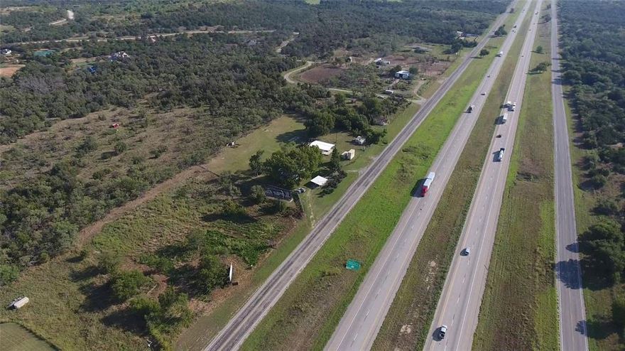 PRIME COMMERCIAL LOCATION ON NORTH ACCESS ROAD INTERSTATE 20, JUST EAST OF 281 INTERSECTION. PRICED RIGHT AND READY TO GO FOR YOUR BUSINESS WITH SANTO WATER METER AND ELECTRIC AVAILABLE.  FLAT TERRAIN WITH A FEW TREES, AND EASY ACCESS TO AND FROM I-20. IDEAL LOCATION FOR YOUR BUSINESS VENTURE, AND PRICED RIGHT!  13.39 ACRES AVAILABLE NEARBY AS WELL.