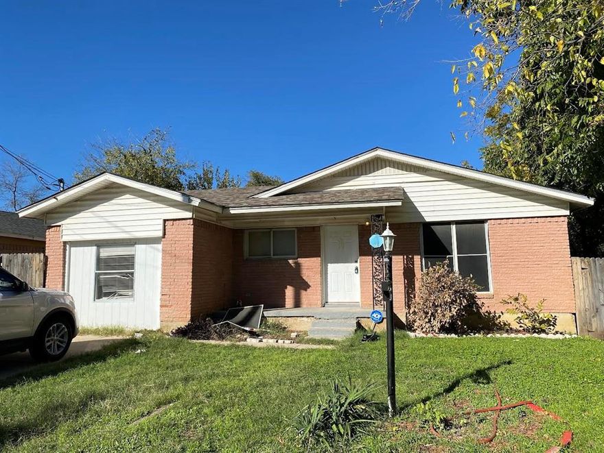 Well-maintained 3-bedroom, 2-bath home with approximately 1,100 sq ft of living space. The property features updated flooring throughout the main areas and an open layout connecting the living, dining, and kitchen spaces.

The kitchen includes stainless steel appliances, a gas range, built-in microwave, and solid surface countertops. Both bathrooms are updated and easily accessible from all bedrooms.

The home offers two living areas, providing flexibility for a home office or additional lounge space. The backyard is fenced with a low-maintenance lawn, and the front yard has good curb appeal.

Located in the Stop Six area of Fort Worth, with convenient access to schools, shopping, and major roads.