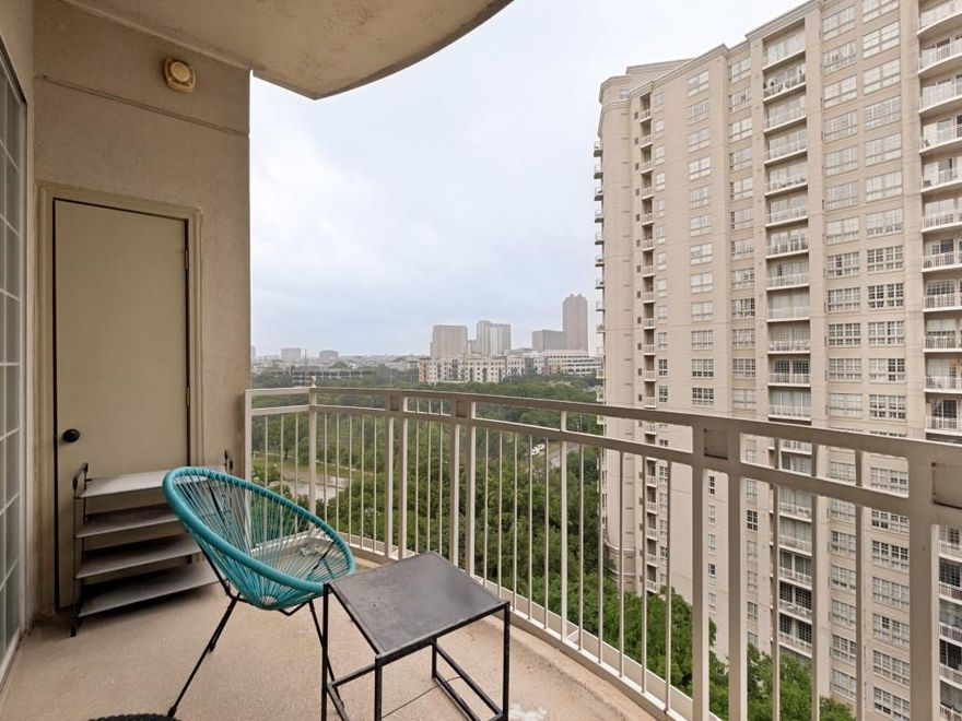 Welcome home to The Renaissance on Turtle Creek! This beautifully updated condo is perfectly positioned to capture views of the park, pool deck, and the Downtown Dallas skyline. 
Wood flooring flows through the main living areas, complemented by granite countertops, a breakfast bar, stainless steel appliances, and updated cabinetry. Thoughtful split-bedroom layout offers ideal privacy, with both bedrooms featuring spacious walk-in closets. The oversized primary suite provides abundant storage and a true retreat feel.
Enjoy indoor-outdoor living on the generous private balcony—perfect for relaxing or entertaining. Ideally located within the building, just steps from the pool deck, fitness center, and amenity level. Assigned parking conveniently located near the elevator.
Community amenities include two pools, 24 hour concierge with valet parking, fitness centers, business centers, and guest suites. The Renaissance offers unbeatable access to the Katy Trail, West Village, Uptown, Downtown, Oak Lawn, and the Arts District.