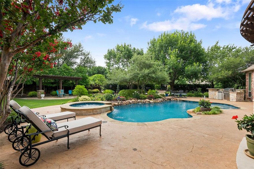 The sellers have carefully re-evaluated the market and priced their home to offer an incredible value for today's buyer! Remodeled all upstairs bathrooms.  Pool remodeled, updated Hardwood Floors, Windows replaced throughout, Garage Doors replaced 2023.  Almost $200K in upgrades since 2021. Ideally located just steps from Southlake Town Square’s premier dining, shopping, and entertainment in the highly sought-after quiet neighborhood of Foxborough. This meticulously maintained home offers the perfect blend of style, comfort, and functionality. The home features an open-concept layout with fresh neutral paint, and rich hardwood flooring. The spacious kitchen includes a large central island and opens seamlessly to the family room and breakfast area, all overlooking the lushly landscaped backyard oasis. Outdoors, enjoy a private retreat with a sparkling pool with spa, outdoor kitchen, and ample space for entertaining. The main-level primary suite includes a generous sitting area. Also on the first floor is a dedicated executive office with privacy for working or studying from home. Upstairs you’ll find four large bedrooms, each with its own updated ensuite bath. Additional upstairs features include a spacious game room with built-in bar and a dedicated media room with a recently replaced projector. An oversized 3-car garage with gated driveway. For the traveler minutes to DFW, this home truly checks every box.