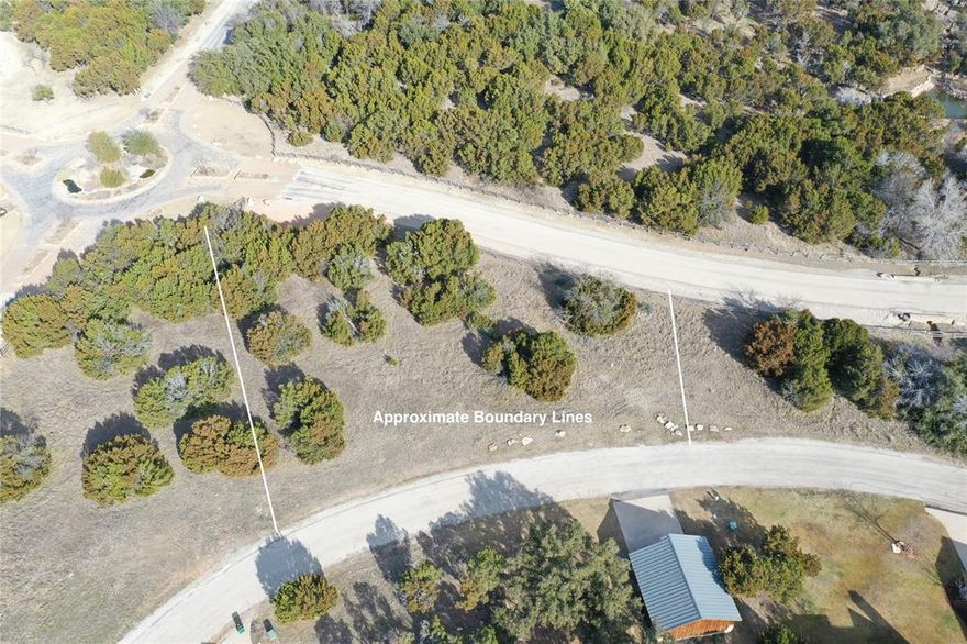 Beautiful, treed lot within the amenity rich Harbor community. Build inside Possum Kingdoms most prestigious development or a great lot to purchase as a membership for access to all of the resort style amenities the Harbor offers. Walking distance to large fishing pond, main resort pool, and the fitness center! The Harbor boasts an array of upscale amenities that can be used year round. HOUSE PLANS AVAILABLE FOR PURCHASE!