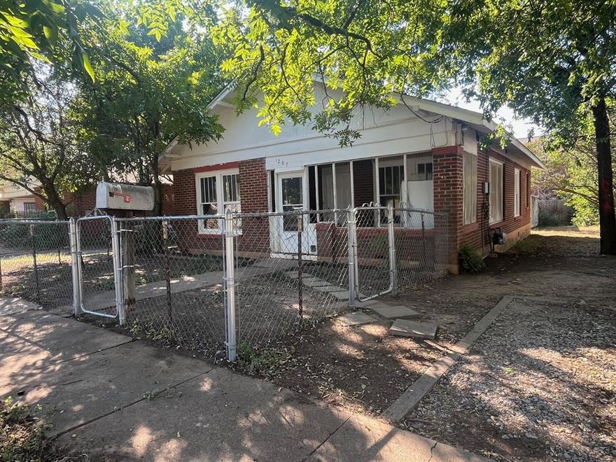 Nice brick home with newer roof and central air!  This little home just needs the right owner to take ahold and finish her up.  Good bones and foundation with a nice arrangement, partially fenced back yard.  This home easily stayed rented at $900mo. but could be much better than that with the right owner