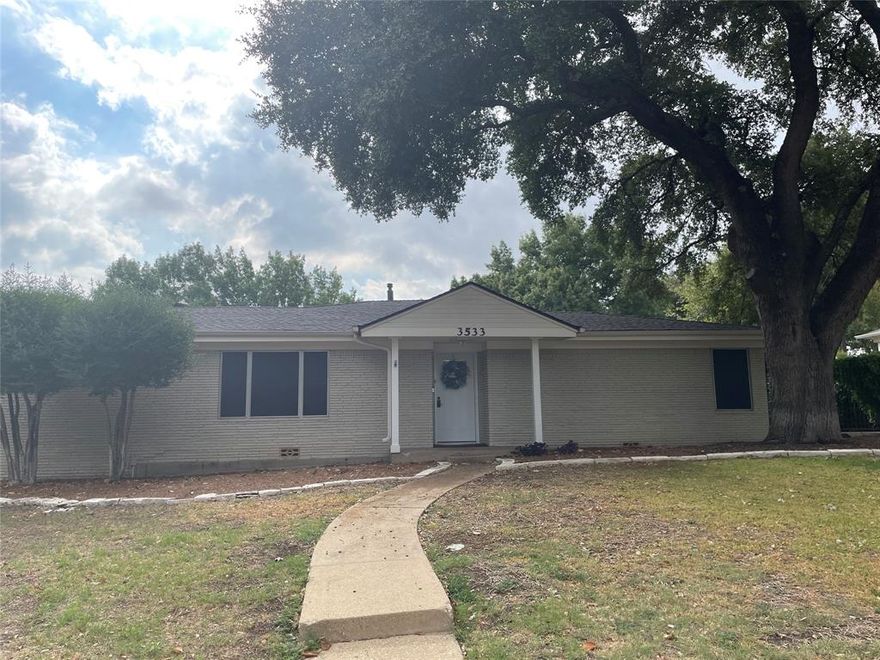 Beautiful home near TCU in the Bluebonnet Hills neighborhood. This corner home offers charming features coupled with modern conveniences. Walk to shopping and grocery stores. 1 mile from the TCU stadium.  Three oversized bedrooms with ample closet space in each room.