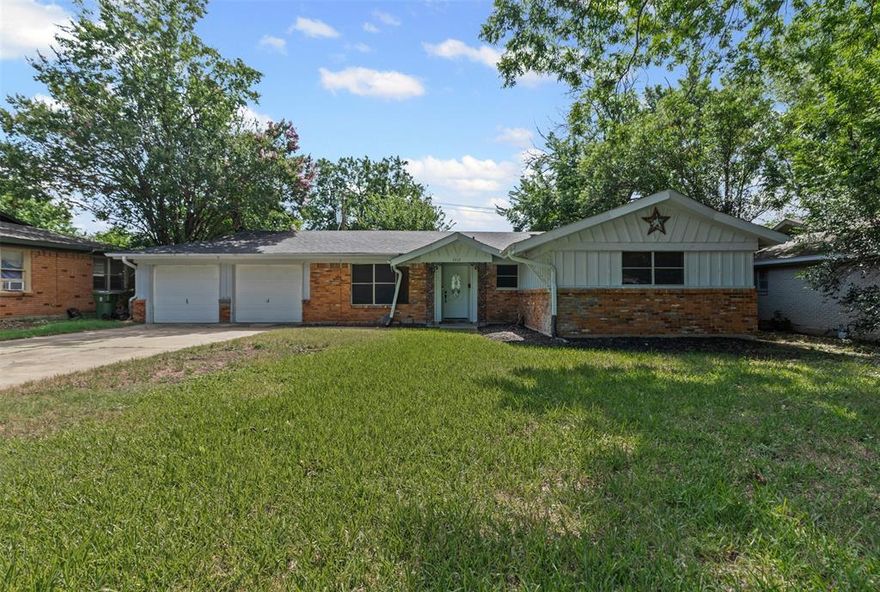 OPEN TO SHORT SALE OFFER--Packed with Potential! Charming 3-bedroom, 1.5-bath home nestled among mature trees and featuring a covered front entrance with gutters. Step inside to find finished wood flooring throughout most of the home, creating a warm and inviting feel. The living room boasts a stylish wooden accent wall and sliding barn door, adding rustic charm. Enjoy a designated dining room that can also serve as a flex space, ideal for an office or second living area. The cozy kitchen is equipped with granite countertops, an overhead microwave, dishwasher, and a charming undermount sink with a window that looks out over the backyard. Ceiling fans in every room provide comfort year-round. The primary bedroom offers ample space and includes an attached half bath for convenience. Two additional good-sized bedrooms share a centrally located full bath. Step out back and let your imagination run wild—this backyard is ready for your vision and perfect for gatherings with family and friends. Come make this house your own!