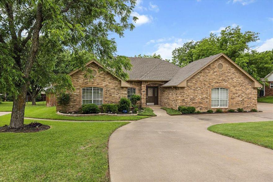 Welcome to Pecan Plantation — where comfort, charm, and functionality come together in this beautifully updated 3-bedroom, 2-bath home with a 2-car plus golf cart garage. Freshly repainted inside, this warm and inviting home offers a cozy atmosphere with thoughtful upgrades throughout. The recently remodeled kitchen features high-end finishes, a large island perfect for gathering and entertaining, all new stainless steel appliances, and the refrigerator stays with the home. The spacious primary suite includes French doors leading directly to the backyard oasis. Step outside to enjoy your own private retreat complete with a sparkling pool, lush yard, mature pecan trees, and a privacy fence creating the perfect setting for relaxing or entertaining. The detached casita adds incredible flexibility and includes a living room, bedroom, and full bathroom — ideal as a pool house, guest quarters, or mother-in-law suite. Additional highlights include a circle drive and oversized driveway offering plenty of extra parking space for guests. This property combines comfort, character, and versatility in one of Granbury’s most sought-after gated golf course communities.
