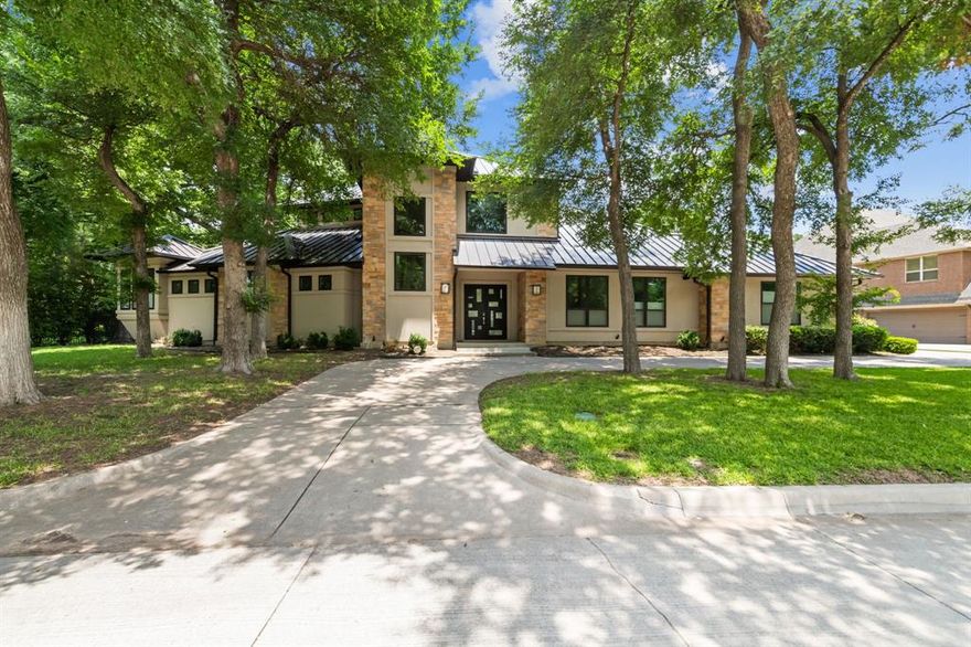 Welcome to your dream home nestled in the exclusive & secured confines of River Bend Estates. This luxurious custom homes is lakefront & boasts unparalleled craftsmanship & top-tier finishes throughout. Soaring ceilings & an open floor plan allow for seamless integration of living spaces. The sleek gourmet kitchen is a chef’s paradise featuring stacked marble backsplash & GE Monogram appliances. Casual & formal dining areas. A serene Primary retreat with patio access & spa-like bath awaits you. Indulge in relaxation with vibrating chromotherapy, separate steam shower enhanced by aromatherapy, towel warmer & direct access to the utility room via the walk-in closet. Multiple living areas open up to the patio, providing a seamless connection between indoor & outdoor living. Upstairs, a loft living space with wet bar & balcony & 2 additional bedrooms & bathrooms. Situated between Fort Worth & Arlington.