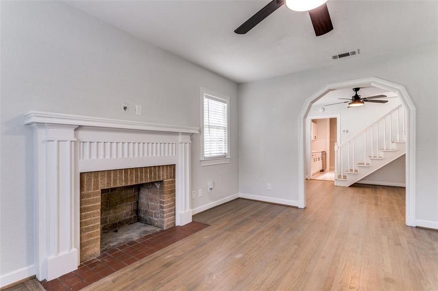 This newly renovated home features the best of both worlds with charming touches of character combined with recent updates to give a modern & elegant feel. The main living space flows seamlessly to the kitchen with features hardwood floors, a cozy fireplace, new decorative lighting & ceiling fans with remotes throughout. Prep meals in the stunningly updated kitchen with sleek quartz countertops, subway tile backsplash & new tile flooring complete with a brand new stainless steel dishwasher, microwave, range & refrigerator. The spacious master bedroom on the first floor includes a private en-suite bathroom. Head upstairs to a large versatile flex space that could serve as a third bedroom, media room, home office or playroom! Outdoors the deck & oversized backyard offers an ideal space for hosting BBQs and enjoying the warm summer weather. Located in a great area where you can enjoy the convenience of being close to all the dining & shopping Bishop Arts offers!