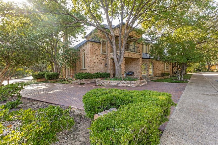 Located in the prestigious gated community of Glen Lakes, this elegant home blends timeless architecture with thoughtful updates. Tall ceilings, intricate moldings, and rich hardwood floors create a warm and inviting atmosphere designed for both entertaining and everyday living.

The main living area features a gas fireplace with a marble surround, framed by floor-to-ceiling windows offering serene views of the creek and walking trail. A second living area with its own marble fireplace opens to the chef’s kitchen, showcasing a built-in gas range, double ovens, warming drawer, and Sub-Zero refrigerator, freezer.

The grand primary suite is a private retreat with its own marble fireplace, direct courtyard access, dual walk-in closets, and luxurious his-and-hers baths—one with a soaking tub and the other with an oversized shower.

Additional highlights include a circular drive with ample parking, pier and beam foundation, three HVAC units, and a roof and gutters and skylights replaced in June 2025. The turfed courtyard provides the perfect low-maintenance outdoor space.

Glen Lakes offers 24-hour guarded security, tree-lined streets, sparkling lakes, fountains, and scenic jogging and biking trails. Perfectly located near NorthPark Center, Preston Center, SMU, and the Dallas Arts District, this community provides both tranquility and convenience.