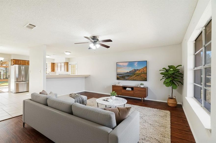 If you’ve been waiting for an affordable way to get into homeownership, this could be the one! This 2 bed, 2 bath home resides in Walnut Hills over in the small community of Reno and is zoned to North Lamar ISD. The home offers a comfortable setting without the higher price tag, while being a great fit for someone just starting out, downsizing, or simply looking for a move-in ready place to call home. As soon as you walk in, dark wood floors and light colored walls pop out to your eyes that highlights the characteristics of this home. Few of the standout features is the open floor plan, oversized back porch, and a spacious backyard that provides plenty of room to unwind after a long day. To put the icing on the cake, all appliances in home transfer to new homeowner. The layout makes the most of its size and offers a practical, easy living feel throughout. Whether you’re buying your first home or adding to your portfolio, this property offers real value in a peaceful location!