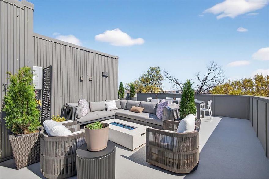 Modern contemporary home with downtown views located in the East Village neighborhood of Dallas. This three-story detached home with a large rooftop offers 2,154 square feet, featuring 3 bedrooms, 3 en-suite full baths, and 1 half bath with an open-concept layout designed for comfortable urban living. The main living level includes a spacious living and dining area with abundant natural light, hardwood flooring throughout, and a well-appointed kitchen with quartz countertops, a waterfall island, a gas cooktop, and Bosch stainless steel appliances.
The primary suite offers a walk-in closet and a private bath with dual vanities and a separate shower. Additional bedrooms provide flexibility for guests or a home office. Interior features include designer lighting, modern finishes, and added surround sound speakers.
Outdoor highlights include a private yard and expansive rooftop deck with downtown Dallas views, ideal for entertaining or relaxing. The home also includes an attached two-car garage with an epoxy floor.
Conveniently located just minutes from Lower Greenville, Knox-Henderson, Uptown, and Downtown Dallas, with easy access to US-75, shopping, dining, and entertainment.