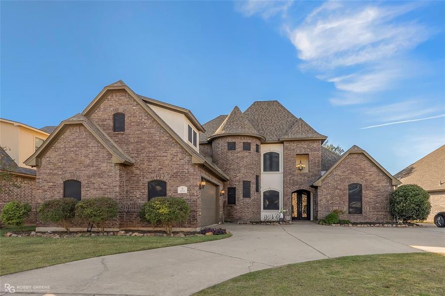 This spacious home offers 5 bedrooms, 3 full baths, and a half bath, plus a handicap-accessible mother-in-law suite on the main level. Enjoy a media room, heated swimming pool, and both indoor and outdoor fireplaces, including one on the covered patio. The kitchen features granite countertops, stainless steel appliances, pantry, and center island. Energy-efficient with spray foam insulation, solar screens, and a tankless water heater. Located in the highly sought-after Belmere community—this home has it all!