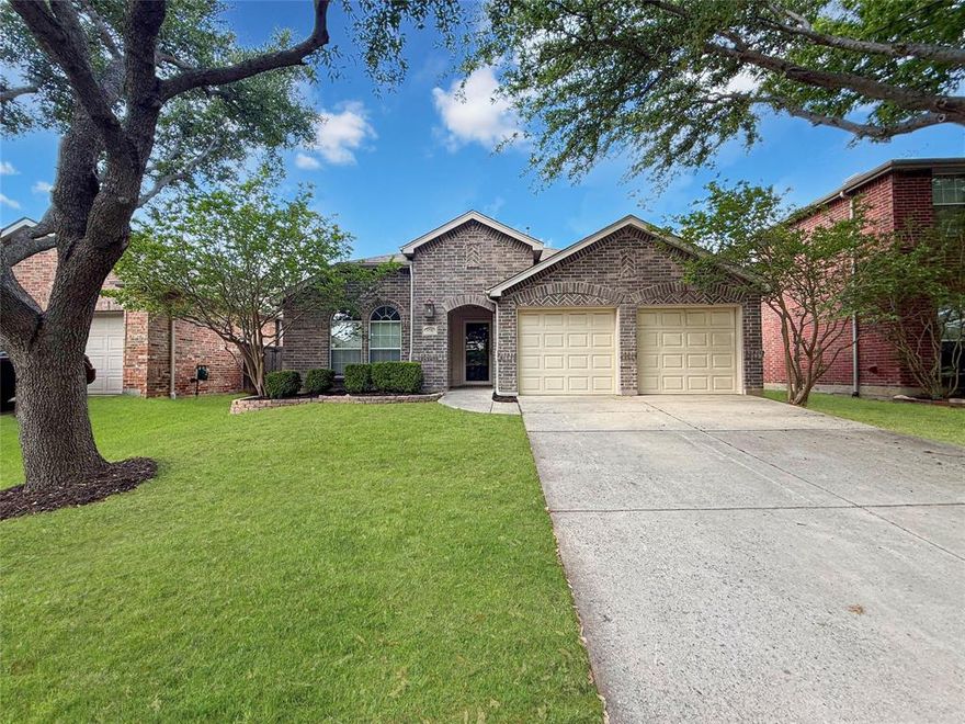 *OPEN HOUSE this Saturday May 9th from 1:00 - 4:00pm* Inviting single-story home with a functional layout, two generous living spaces, and a spacious covered patio perfect for relaxing or entertaining. The kitchen is filled with natural light and features stainless steel appliances, opening to a comfortable breakfast area and a welcoming family room with a corner fireplace. The primary suite showcases vaulted ceilings, an oversized walk-in closet, and a private bath with a garden tub and separate shower. Secondary bedrooms also offer vaulted ceilings and walk-in closets, with a flexible bonus living space between them—ideal for a game room, office, or play area. Additional features include a dedicated utility room, a large grassy backyard with a covered 16’ x 8’ patio, a wood privacy fence with steel posts, and a two-car garage. Located just minutes from parks, recreation, and fitness amenities, this home offers both comfort and convenience.