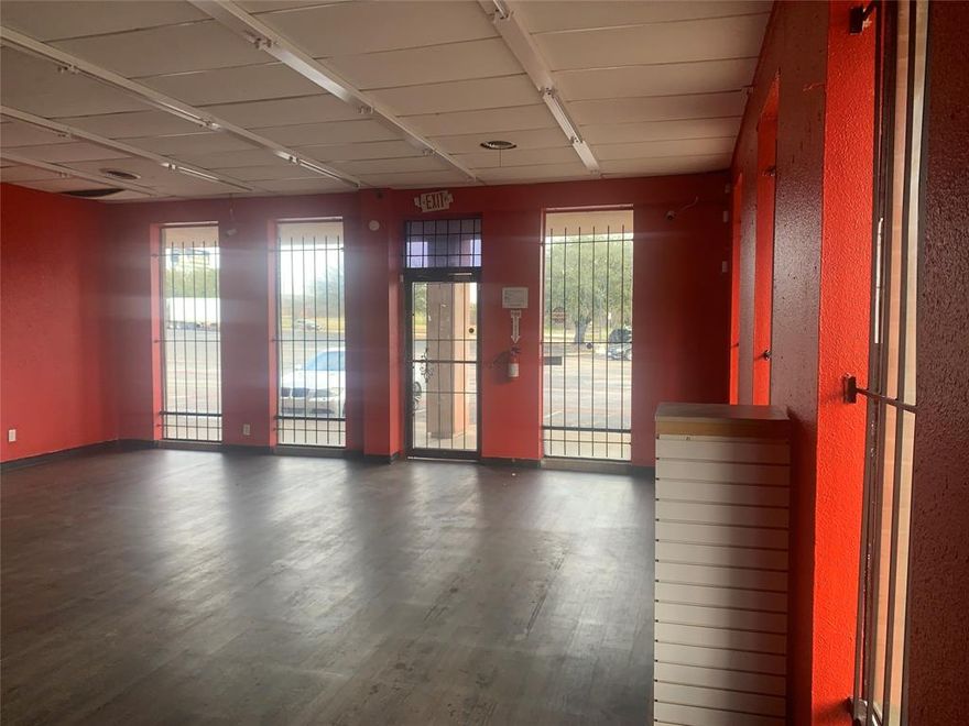 A perfect commercial property for your business needs - a 1000 square foot space. Located in a prime retail location near Highway 67 and Interstate 35, this property offers a ton of possibilities for small business owners. Currently used as a convenience store, but could be a check cashing place, small retail store or small office.  The property has updated flooring, paint, and a secure room.  If you're looking to establish a boutique retail store, a modern office, or a convenience store, this property offers the versatility to accommodate your vision. Don't miss out on this incredible opportunity to secure a 1000 square foot commercial property that is smoke-free and ready to accommodate your new business. Tenant responsible for utilities and common area maintenance, pro-rata taxes and insurance. Tenant and agent to verify square footage, property condition, and fixtures. CAM 1425.55 per year, $118.80 per month. Non-smoking facility.