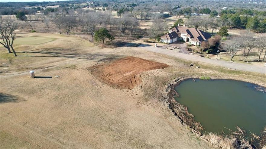 Tucked away at the quiet end of Palmer Ln, this exceptional build-ready lot offers a rare opportunity to create a custom home within the prestigious Tanglewood Resort community in Pottsboro. Backing to a manicured golf green and serene pond, the setting delivers privacy, scenic views, and a sense of calm that’s increasingly hard to find. Residents enjoy access to championship golf, clubhouse amenities, dining, and the lifestyle of a premier Lake Texoma community—all just minutes from the water. An ideal homesite for those seeking refined living in a thoughtfully established neighborhood.