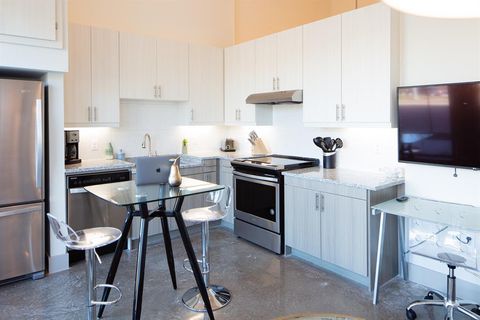 Photo of 830 N Zang Boulevard #1204, Dallas, TX 75208 (MLS # 21275873)