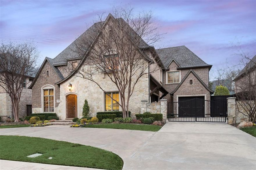 This impeccably-maintained Country French Preston Hollow home custom built by Dallas’ award winning Thomas Signature Homes as the builder’s personal residence blends timeless tradition with clean, elegant lines. Located on the prestigious street, Deloache, named after the original developer of Preston Hollow, the home was masterfully sited on the 75 x 140 lot. The three-car garage and motor court are secured by a remote-controlled steel gate, with an additional circular driveway providing ample off-street parking. The open-concept design seamlessly connects the two-story family room, kitchen, breakfast room, and dining room, creating a warm and inviting space for everyday living and entertaining. The chef’s kitchen features a spacious central island with seating, a walk-in pantry, Wolf gas range, Bosch dishwasher, Sub-Zero refrigerator, and granite countertops. A built-in display hutch with glass upper cabinets enhances the breakfast room’s charm. The family room boasts custom built-ins, a stunning cast stone fireplace, and a vaulted ceiling with exposed beams, adding character and warmth. The first-floor primary suite is a private retreat with a luxurious bathroom featuring an oversized shower, a decked soaking tub, and dual sinks. A first-floor guest suite includes an attached bath that also serves as a second downstairs powder room. A handsome wood-paneled study with a vaulted ceiling and French doors opens off the foyer, offering an elegant workspace. Upstairs you’ll find three additional bedrooms—one with an ensuite bath and two sharing a Hollywood bath. A spacious game-billiard room with a wet bar adjoins a separate media room. An additional flex space could be ideal as a dedicated exercise or craft room. The expansive backyard offers plenty of space for a future pool and is enhanced by a large covered outdoor living area, complete with a built-in grill and a wood-burning fireplace—perfect for year-round entertaining. Walking distance to Preston Hollow park.