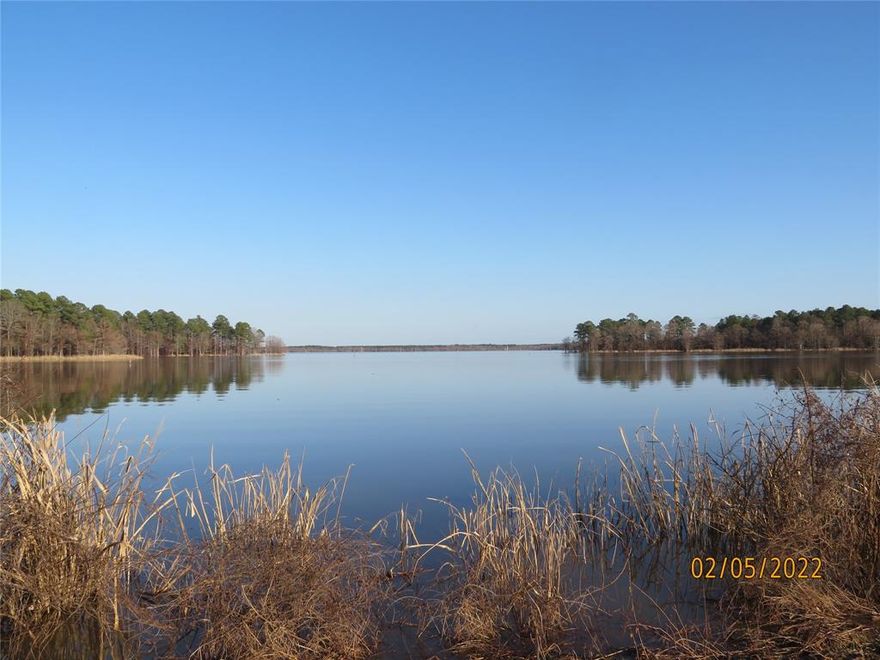 Lake front lot on beautiful Lake Erling. Just north of Arkansas state line near Springhill, LA. Located in a gated community with HOA, underground electric & sewer tap (One time sewer tap fee.). Cleared & ready for your dream home or just your weekend hide away. No MFG homes. (Photos may be a scenic view of Lake Erling & may not be representative of actual lot.)