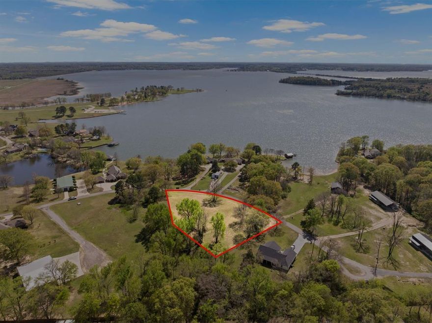 Rare opportunity on Lake Bob Sandlin! Nearly one acre of prime water view property with no HOA...a true gem that’s getting harder and harder to find. Perched on a hill, this property offers stunning, elevated views of the lake, making it the perfect setting to build your dream home or weekend getaway. Conveniently located near a public boat ramp and just a short drive to both Pittsburg and Mount Pleasant, you get the best of peaceful lake living with easy access to amenities. Don’t miss your chance to own a slice of East Texas!
