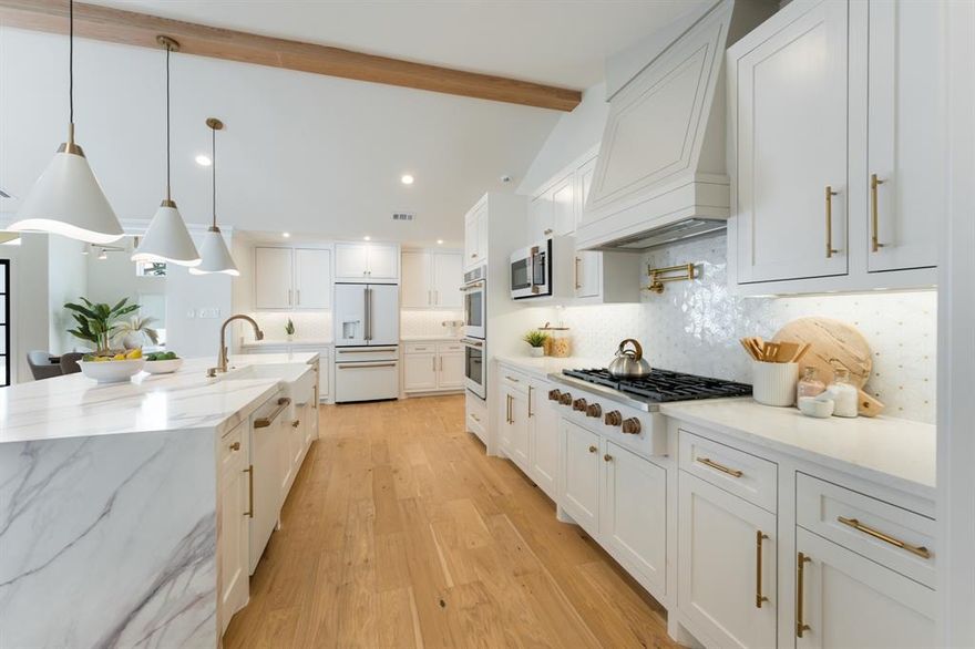 Exceptional modern custom construction by Pronir Custom Homes, originated from the United Kingdom, created a unique home which is nestled on a beautifully landscaped .38-acre lot in the heart of Dallas’ premier private school corridor. This residence exudes timeless character blending modern and traditional architectural sophistication from the present and the past. This extensive one-story residence offers thoughtful functionality along with privacy and convenience all tying in an array of high-end features that create the ambiance for any occasion. The heart of the home is the chef’s kitchen with imported exotic quartz island and a butler’s pantry—all adjoining multiple living spaces to accommodate both entertaining and daily family life. A finished office or bedroom with built-ins offers work-from-home flexibility while still maintaining the usability as a bedroom. Energy-efficient systems such as full foam insulation, tankless water heaters, Lutron lighting system throughout, and full exterior security surveillance ensure modern comfort and longevity.The primary suite is a retreat of its own, featuring a spa-like bath with dual shower and soaking tub, plus a luxurious custom walk-in closet with thoughtfully designed storage; perfect for storing and showcasing apparel and accessories. Outdoors, enjoy a private oasis with a custom heated pool with spa and integrated chef’s kitchen built into the covered patio — the perfect setting for year-round relaxation and entertaining. The large lot provides ample space for family activities and gatherings.