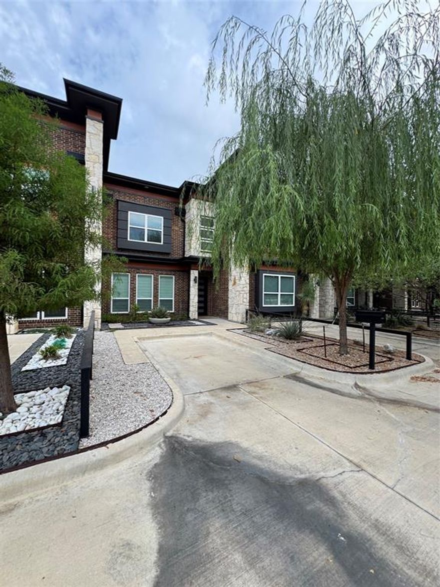 modern townhouse open floor plan, off hwy287, minutes from downtown. gated community surrounded by big trees. living area is open and bright, under stairs and a half bathroom with vessel sink.  Eat-in kitchen has all Samsung appliances.  Refrigerator is a smart fridge and dishwasher has 3 racks, range and microwave Nice private back porch and yard.  Located upstairs is 3 bedrooms 2 full bathrooms.  Hall bedrooms have big box windows.  Spare bathroom has tile tub, bath walls, handheld shower sprayer, floor to ceiling niche with shelving and a place to hold a hamper.  Granite countertop and vessel sink.  All bedrooms, closets and hallway have real wooden floors.  There are 2 storage closets in hallway.