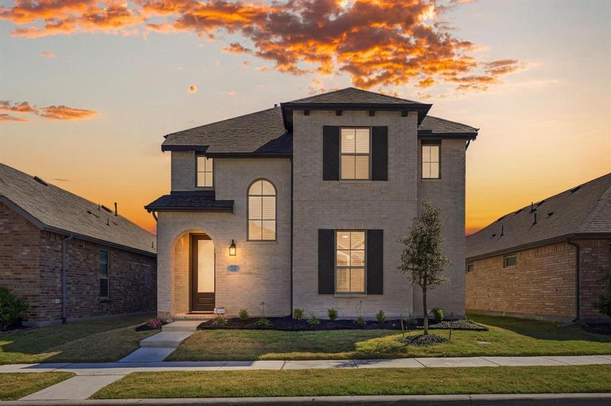 Discover a lifestyle of effortless modern luxury in this 2021-built two-story sanctuary where soaring ceilings and extensive luxury vinyl plank flooring set a grand, airy tone throughout the open-concept layout. The culinary space is a showstopper for both daily meals and high-end entertaining, featuring quartz countertops, sleek cabinets with modern hardware, and stainless steel appliances. A massive island with a breakfast bar serves as the ultimate gathering hub, anchored by a stylish apron-front sink. Retreat to the secluded downstairs primary suite, a private haven boasting a dual-sink vanity, an oversized shower, and a genius walk-in closet that offers a direct pass-through door to the utility room for seamless chores. Work with focus in the dedicated home office or head upstairs to the expansive game room, perfect for movie nights and recreation. Every bedroom in this thoughtfully designed 3,912-square-foot floor plan includes its own walk-in closet, ensuring ample storage for everyone. Downstairs highlights include 8-foot 6-panel interior doors that elevate the interior aesthetic, while the custom mud room provides a clean transition from the rear-facing two-car garage. Efficiency is built-in with LED lighting, a tankless water heater, and a private backyard featuring a covered patio and pristine, low-maintenance artificial turf grass. Residents of Wellington enjoy exclusive access to the community pool, lake, park, and playground, all with easy access to Highway 287 and downtown Fort Worth for effortless commuting. Take a first-person look at this gorgeous home! Click the Virtual Tour link to see the 3D Tour!