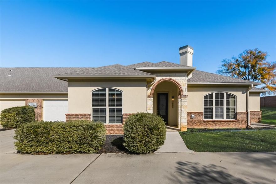 Located within the gated Cottonwood Village community of Fort Worth, this single-story residence is waiting for you to make it your home sweet home. The expansive open-concept layout offers well-appointed, elegant spaces that effortlessly flow into one another, creating the perfect setting for both everyday living and entertaining. The inviting family room is filled with natural light and provides ample space for relaxation and hosting guests. The chef in your family will love preparing meals in the stylish and functional kitchen, featuring crisp white cabinetry, granite counters, and sleek stainless steel appliances, including an electric cooktop and double ovens. The primary suite features an ensuite bathroom with dual sinks and a walk-in closet. Adjacent to a full bath, the guest suite provides the flexibility of a second primary - perfect for accommodating family or friends. The open backyard has plenty of space for outdoor activities and includes a dedicated patio that makes an ideal seating area to relax and unwind. Prime location with easy access to Interstate 30, Highway 820, DFW airport, and countless shops, restaurants, recreation, and local attractions, including AT&T Stadium, River Legacy Parks, and the Waterchase Golf Club - ideally positioned right next to the community.