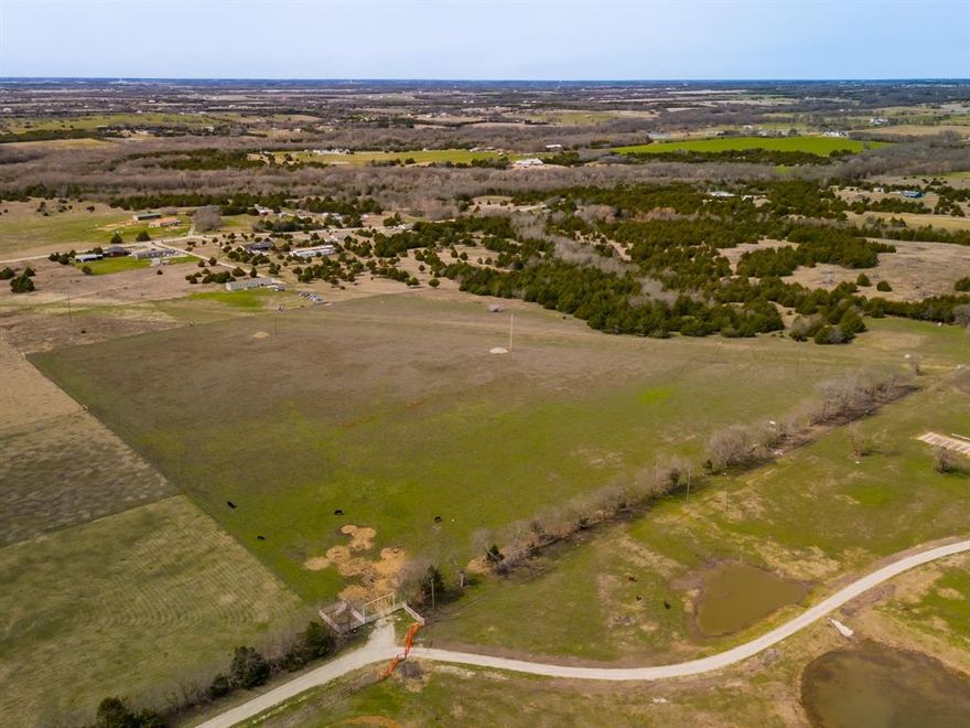 23 ACRES OF PRIME TEXAS LAND - UNLIMITED POTENTIAL!   Discover 23 acres of picturesque agricultural land, perfect for cattle, horses, or your dream homestead.  With NO RESTRICTIONS,  you have the freedom to build your ideal home, barns, or ranching operation. This beautiful property features lush pastures, mature trees, and a pond, all outside the floodplain for peace of mind. 
Located in the highly regarded Leonard ISD, this countryside retreat offers both privacy and convenience, being just a short drive to Greenville and McKinney for work, shopping, and dining. 
Whether you are looking to farm, ranch, or create a private escape, this land is ready for your vision!  
Come out today, and bring your offer to purchase this amazing property!