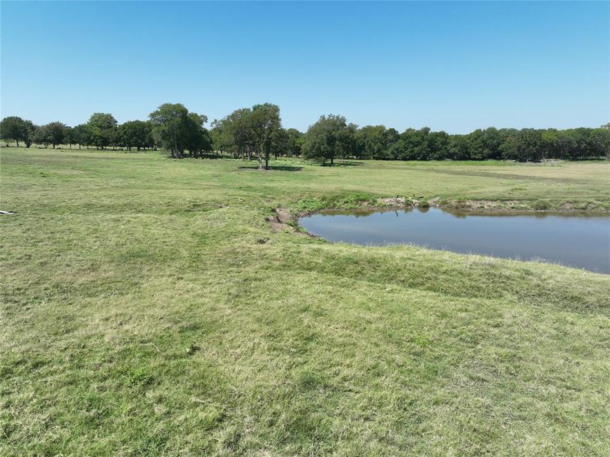 If you're looking for the perfect place to escape the city or make an investment this is the property for you! Build a house on the hill looking down into the beautiful bottom land or run your own cattle. The entire property is fenced and cross fenced. Currently the owner is grazing cattle on wheat. The property offers great recreational potential with plenty of deer and hogs. There is also a seasonal creek at the back of the property. Owner has spent thousands clearing brush to open up the view of the bottom. 80% of the property is in FEMA floodplain.