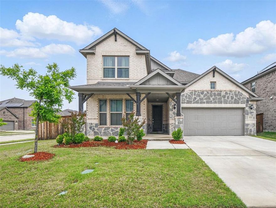 This stunning one-owner 2021 brick and stone home sits on a PRIME CORNER LOT, offering added privacy in the sought-after, amenity-rich Berkshire Community within the highly acclaimed Northwest ISD. Designed for both comfort and entertaining, the home features an open-concept layout where the kitchen, eat-in area, and living spaces flow seamlessly together.

The inviting living room showcases soaring ceilings and a warm fireplace, creating an airy yet cozy atmosphere. The spacious kitchen features a large center island, dry bar, gas cooktop, and stainless steel appliances, plus a dining area ideal for gatherings.

The thoughtfully designed floor plan includes a first-floor primary suite with a sitting area and a luxurious en-suite bath with dual sinks, garden tub, separate shower, and two walk-in closets. A first-floor guest bedroom sits across from a full guest bath, perfect for visitors or multi-generational living.

Upstairs offers a HUGE game room, a separate media room pre-wired for sound, a convenient half bath, two spacious bedrooms, and a full bathroom.

Step outside to the extended 26’ x 8’ covered patio with two electrical outlets and a gas line hookup—perfect for BBQs or relaxing outdoors.

Berkshire residents enjoy a community pool, amenity center, gazebo, playground, and walking trails. Ideally located minutes from parks, major highways, Alliance Town Center, and Presidio Towne Crossing with shopping, dining, and H-E-B nearby. Approximately 15 minutes to Downtown Fort Worth and 26 minutes to DFW Airport.

Designed for energy efficiency, the home includes a solar system that keeps power bills under $60, can charge an electric vehicle (with plug installation), and support a future pool. Estimated savings of $450–$500 per month.

This home offers the perfect blend of suburban tranquility, modern convenience, and energy-efficient living. Schedule your private tour today.