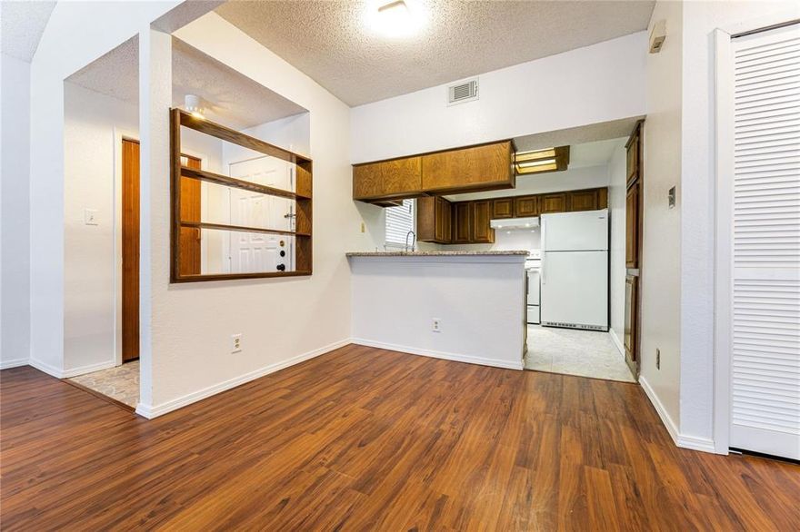 Cozy & bright one bedroom condominium located in a prime location in West Plano.  Updates include granite counter tops, beautifully remodeled and extra spacious bathroom. Brand new ac system installed May 2025. Kitchen appliances were replaced in 2021,  new dishwasher in November 2024,  new energy efficient windows through out 2021.   Spacious primary bedroom with coffered ceiling and a large walk-in closet.  Second floor condominium. Community pool.   Great investment opportunity as well.  Water, sewer and trash are included in monthly HOA dues.  One covered parking located in front of condo. Minutes away from major highways, retail shops, restaurants and entertainment. Welcome home!