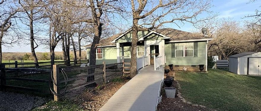 2 Acres • Shop with Electric • Fully Fenced • Outside City Limits • Paradise, TX
Tucked away on a private road, this property offers a peaceful sense of seclusion and privacy...
Enjoy peaceful country living on this beautiful 2.00-acre property featuring a charming 3 or 4 bedroom, 2-bath home with an open-concept layout and large butcher block island. The flexible floor plan offers a fourth bedroom that could easily serve as a second living area with office space.
Step outside onto the large deck overlooking the peaceful property, surrounded by mature trees and frequent wildlife. Spend evenings relaxing in nature or gather around a bonfire under the Texas stars.
The property includes a large shop with electric and 3 bay doors, carport, storage shed with loft, chicken pens, and separate storage-well house. With no restrictions and fencing already in place, the land is ideal for animals, hobbies, or enjoying wide-open space.
Conveniently located just minutes from nearby towns, shopping, dining, and schools, this property offers the perfect balance of quiet country living and convenience.
If you’re looking for space, privacy, and the freedom of country living, this Paradise property is a must-see. Priced to sell and ready for its new owner.
Outside city limits on 2 acres with a shop, fenced land, and room to bring your animals.