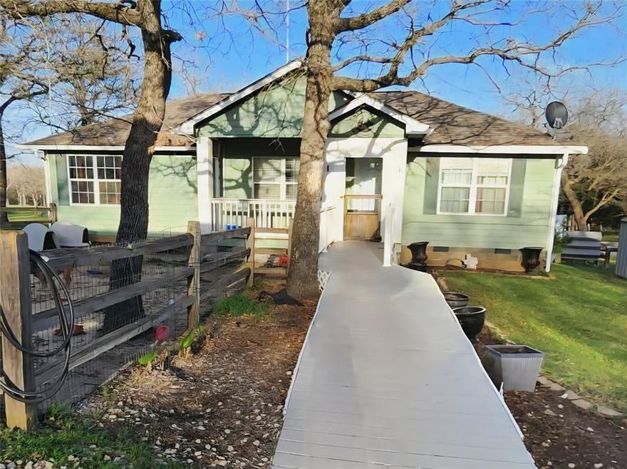 2 Acres • Shop with Electric • Fully Fenced • Outside City Limits • Paradise, TX
Tucked away on a private road, this property offers a peaceful sense of seclusion and privacy...
Enjoy peaceful country living on this beautiful 2.00-acre property featuring a charming 3 or 4 bedroom, 2-bath home with an open-concept layout and large butcher block island. The flexible floor plan offers a fourth bedroom that could easily serve as a second living area with office space.
Step outside onto the large deck overlooking the peaceful property, surrounded by mature trees and frequent wildlife. Spend evenings relaxing in nature or gather around a bonfire under the Texas stars.
The property includes a large shop with electric and 3 bay doors, carport, storage shed with loft, chicken pens, and separate storage-well house. With no restrictions and fencing already in place, the land is ideal for animals, hobbies, or enjoying wide-open space.
Conveniently located just minutes from nearby towns, shopping, dining, and schools, this property offers the perfect balance of quiet country living and convenience.
If you’re looking for space, privacy, and the freedom of country living, this Paradise property is a must-see. Priced to sell and ready for its new owner.
Outside city limits on 2 acres with a shop, fenced land, and room to bring your animals.