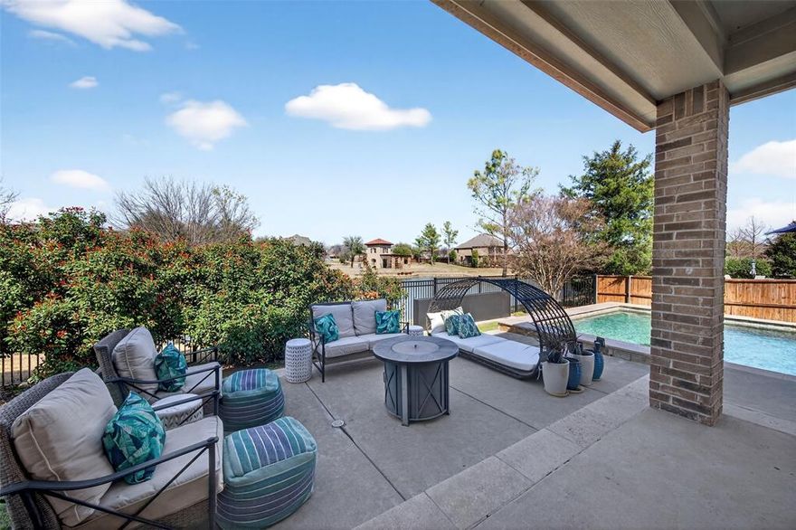 Experience refined living in this impeccably updated, move in ready home offering over 4,200 square feet of beautifully designed space in a highly desirable Keller ISD location. Perfectly positioned on a corner lot along a quiet cul de sac street, the home enjoys peaceful views of the community greenspace and pond, creating a serene backdrop for everyday living. At the heart of the home is a thoughtfully reimagined chef’s kitchen featuring custom cabinetry with pull out drawers in every lower cabinet, a built-in spice drawer, updated flooring, designer lighting, and new appliances seamlessly blending functionality with timeless style. Luxury finishes elevate the home throughout, including warm handscraped hardwood floors across the main level, plush carpeting upstairs, motorized window coverings, and epoxy finished floors in the expansive three car garage. Recent major updates, including new HVAC systems and a newer roof, provide both comfort and peace of mind. Designed for both entertaining and everyday living, the spacious floor plan offers four bedrooms, a dedicated home office, three and a half bathrooms, a game room, and a private media room. A partially finished attic provides abundant storage or the opportunity to create additional living space. Step outside to your private backyard retreat, where the pool, equipped with a new pump and filters, overlooks the tranquil community green space and pond, creating the perfect setting for relaxation or entertaining. Located within highly sought after Keller ISD, the home feeds into Keller High School and is within walking distance to Keller Harvel Elementary and Keller Middle School, offering the perfect blend of luxury, comfort, and convenience. Don't wait, schedule your showing today!