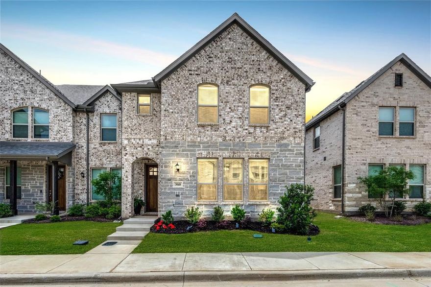 Stunning, modern, and barely lived in! This like-new townhome built in 2024 in Corinth’s Timber Ridge addition offers a move-in ready opportunity without the wait of new construction. The home features 3 bedrooms, 2.5 baths, a 2-car garage, and 2,298 square feet with an open layout designed for comfort and functionality. The main living area is located on the first floor, while all bedrooms are positioned upstairs, creating a natural separation between everyday living and private spaces. The open-concept design allows the kitchen, dining, and living areas to connect seamlessly. Wood-look tile flooring adds durability and a modern feel, while the kitchen anchors the space. The large island with quartz countertops is designed for entertaining groups large or small, with gas cooking and ample storage. Clean cabinetry lines with rich gold hardware and a cohesive color palette give the space a polished, modern look. The layout works well for both daily routines and hosting friends or family. Off the kitchen is a mudroom.  Upstairs, the primary suite offers a comfortable retreat with dual sinks, quartz countertops, a spacious walk-in closet, and a spa-like bathroom. A separate living area provides flexibility for a home office, game room, media room, exercise space, or playroom. Secondary
bedrooms provide additional flexibility for guests or everyday living. Smart home features add everyday convenience, while a rear-entry two-car garage, covered patio, and manageable outdoor space support a low-maintenance lifestyle. Located with easy access to shopping, dining, and DFW Airport, this home delivers everyday convenience. It is also just minutes from University of North Texas and Texas Woman's University.  Buyer may have the opportunity to assume the seller’s existing 4.99% loan, subject to lender approval and buyer qualification. A home this well designed and move-in ready deserves to be seen in person.