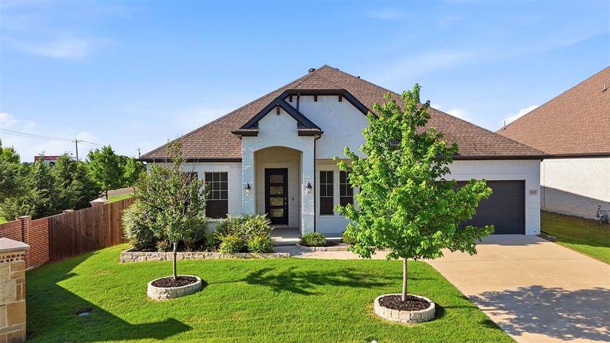 Welcome to 2213 Windy Hill Lane in Waxahachie - a beautifully maintained 2021-built home offering 4 bedrooms, 3 bathrooms, and a flexible, thoughtfully designed layout in Sheppard’s Place.

Step inside to an open-concept main living space where the living and dining areas flow seamlessly together, creating one large, inviting area filled with natural light and anchored by a cozy fireplace. Decorative lighting and modern finishes give the home a clean, elevated feel.

The kitchen is designed for both everyday living and entertaining, featuring granite countertops, a large island, ample cabinetry, and a walk-in pantry.

The split-bedroom layout provides privacy, with a spacious primary suite that includes dual sinks, a separate shower, and a large walk-in closet. The custom 15' x 6' closet offers built-in storage and dedicated shoe space - a standout feature for organization and functionality.

A dedicated office adds flexibility for working from home or creating a quiet retreat.

This home has been lightly lived in for just one year, offering the feel of new construction without the wait. Energy-efficient solar panels, to be paid off at closing, provide the added benefit of significantly reduced utility costs, with previous electric bills averaging under $100 per month.

Enjoy outdoor living year-round on the covered back porch (18' x 9'), overlooking the backyard - ideal for relaxing evenings or weekend gatherings.

Situated at one of the main entrances to the neighborhood, this home offers convenient access in and out of the community, making daily commutes to US-287 and I-35E quick and efficient.

Additional highlights include a 2-car garage, utility room, and access to Waxahachie ISD.