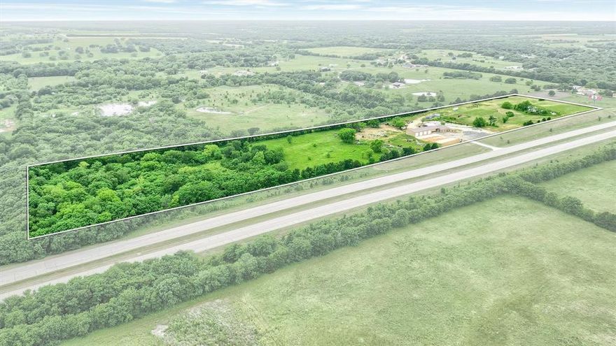 Unbeatable opportunity with just under 18 acres of Ag-exempt land featuring extensive frontage on Hwy 82 in Sherman, Texas. This property includes a newly constructed commercial building with a pier slab foundation, ideal for a wide range of business uses. The building features multiple office spaces including kitchen, dining area, and extra garage ready for immediate occupancy. Enjoy the scenic beauty of a gorgeous pond, adding both charm and potential for additional recreational or aesthetic value. Located in an incredible central location, this property is just minutes from Sherman, TX, offering convenience without sacrificing  space or privacy. Whether you're looking to launch a business, expand your operations, or explore development opportunities, this rare piece of real estate offers unlimited potential.