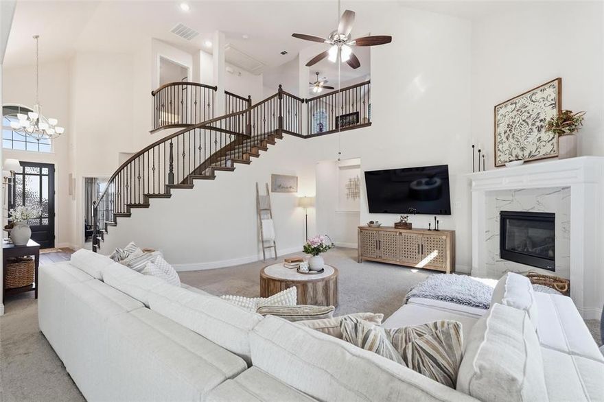 Welcome to a stunning luxury residence located within the highly desirable Rockwall Independent School District and built by the prestigious First Texas Homes. This exceptional property blends upscale design, thoughtful functionality, and timeless craftsmanship in one of Rockwall County’s fastest-growing communities.

From the moment you arrive, the striking curb appeal and architectural detailing set the tone. Inside, an expansive open-concept layout is designed for both elegant entertaining and comfortable everyday living. Natural light fills the spacious living areas, seamlessly flowing into a chef-inspired kitchen featuring designer cabinetry, premium finishes, a large center island, and abundant storage.

This home offers the space today’s luxury buyers demand, including a dedicated private office ideal for remote work or executive productivity, along with an impressive media room perfect for immersive movie nights, game days, or hosting guests.

The primary suite serves as a true retreat, complete with a spa-style bath featuring dual vanities, a soaking tub, separate shower, and a generous walk-in closet. Secondary bedrooms offer flexibility for family or guests, all appointed with quality finishes throughout.

A rare three-car garage provides ample space for vehicles, storage, or hobbies — a highly sought-after feature among move-up and luxury buyers.

Built with energy-efficient construction and elevated design elements, this home reflects quality at every turn. Conveniently located near shopping, dining, and major commuter routes into Dallas, residents enjoy both lifestyle and accessibility. Being zoned to Rockwall ISD adds significant value, offering strong academics, athletics, and community engagement that discerning buyers prioritize.

619 Cirrus Lane is more than a home — it’s a statement of refined living in Fate, Texas.

Schedule your private showing today.