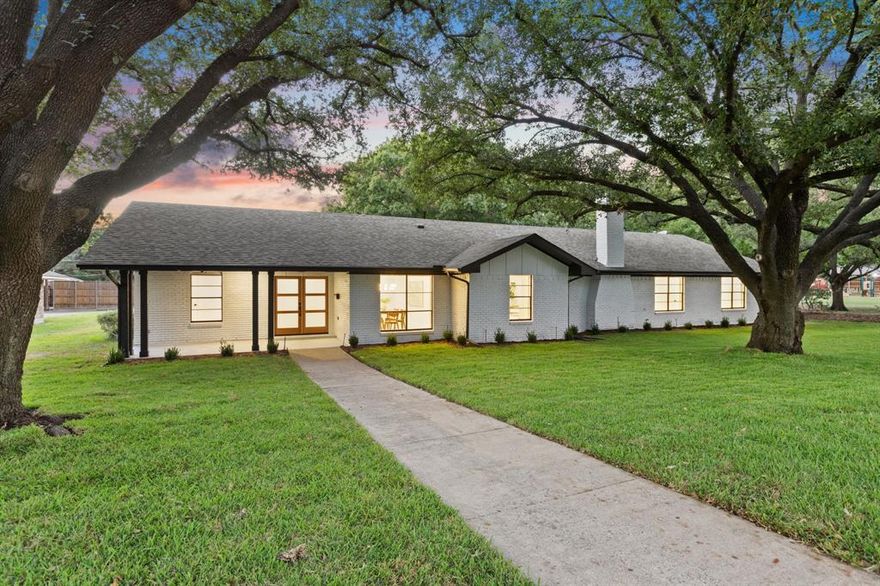 Welcome to 12151 Crestline — where timeless design meets modern luxury in Dallas’s coveted Private School Corridor. Fully reimagined from top to bottom, this four-bedroom, three-bath home features a bright open layout, multiple living areas, and seamless indoor-outdoor flow through a 12-foot sliding glass door. The chef’s kitchen offers custom cabinetry, a quartz waterfall island, and premium Thor appliances. Wide-plank white oak flooring, Kohler fixtures, and designer lighting elevate every room. The primary suite includes double walk-in closets and a spa-like bath with dual vanities and an oversized shower. Outside, mature live oaks and a spacious patio create an inviting space for entertaining. With a three-car garage, epoxy floors, and a prime location near top private schools, major highways, and upscale dining, this home perfectly blends comfort and sophistication.