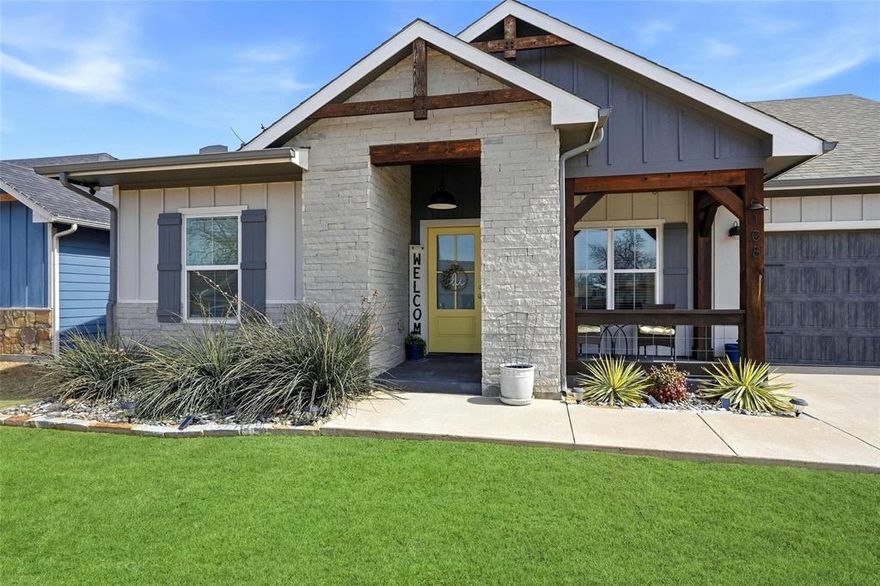 Welcome to 108 Clay Lane in Tom Bean, Texas — a beautifully maintained 2019-built home offering 1,689 square feet of thoughtfully designed living space with custom upgrades you won’t typically find at this price point.

The open-concept floor plan creates a spacious feel from the moment you walk in, with stunning wood beams in the living room adding warmth and character. The layout flows seamlessly into the kitchen and dining area, making it ideal for entertaining or everyday living.

This home features 3 bedrooms plus a dedicated office that could easily serve as a 4th bedroom, playroom, or flex space to fit your needs.

Step outside and you’ll find where this property truly shines — a 16’ x 30’ covered patio complete with a bar and cast iron fireplace, creating the perfect outdoor living space for relaxing evenings or hosting friends and family. Additional exterior upgrades include cedar accents on the front elevation, an 8’ privacy fence, and a 10’ x 12’ storage building for extra functionality.

With no PID and no MUD, this almost-new home offers affordability without sacrificing quality or custom touches. If you’ve been looking for move-in ready with upgrades already done, 108 Clay Lane deserves a closer look.