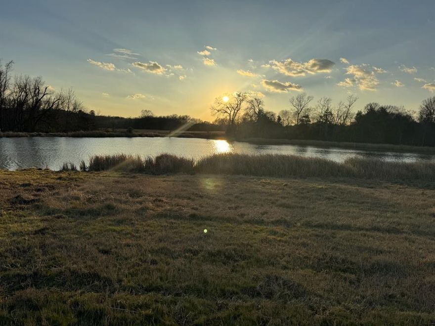 Hickory Creek Ranch - This exceptional 1,640± acre ranch is a rare offering ideally suited for a commercial cattle operation, with an outstanding combination of abundant grass, year-round water, and rolling topography. Approximately 85% of the property is grazeable, including 260± acres of improved coastal hay meadow, and is currently operated as a commercial cow-calf ranch.
Water is a defining feature, with 12 spring-fed lakes and ponds, multiple live springs, and Ioni Creek running through the property, providing reliable year-round water for livestock and wildlife. The ranch is cross-fenced into 11 pastures, allowing for efficient grazing rotation, and is fully perimeter fenced.
Improvements include a 200’ x 40’ hay barn, equipment shed, three covered horse stalls, tack room, and working pens. A historic home site, surrounded by mature live oak, cypress, and cedar trees, offers an ideal setting for a foreman’s residence or future homesite. With over 140 feet of elevation change, the property also features multiple scenic hilltop building sites overlooking the ranch.
An extensive network of internal roads and trails provides excellent access throughout. The property offers approximately 4,000 feet of frontage along State Highway 294, 3,600 feet along FM 2022, and 2,000 feet along Union Hope County Road. Located approximately two hours from Dallas and Houston, the ranch also has fiber internet available and access to community water.
A truly unique, well-watered and highly productive ranch ready for continued cattle operations or future legacy ownership.