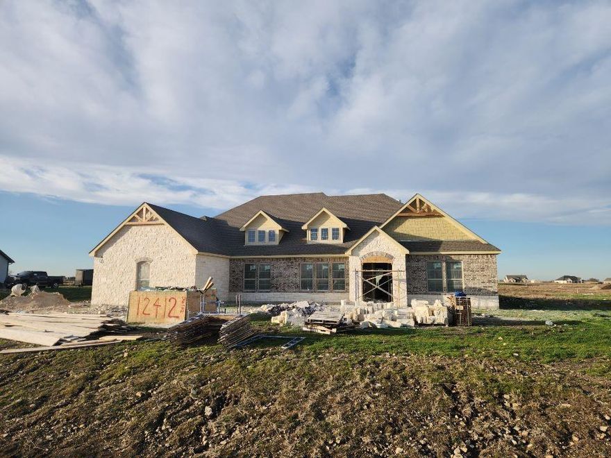 Estimated May 2026 completion! Ask us about our Trade In Trade Up program, we can buy your home! SPRAY FOAM ENCAPSULATED!  Discover the allure of the Foxglove plan, an epitome of sophistication and comfort crafted by Riverside Homebuilders. This luxurious one-story abode spans 3,497 square feet, offering 4 bedrooms and 3 bathrooms, meticulously designed for modern living. With a 3-car garage and a thoughtful layout, convenience and elegance seamlessly intertwine to create an unparalleled living experience. As you step through the front door, you're greeted by an open and airy foyer with wood look tile in the main areas, setting the tone for the home's inviting atmosphere. Off of the foyer, the luminous dining room awaits, perfect for hosting memorable gatherings with friends and family. Adjacent to the foyer, discover two versatile flex rooms, adaptable to your every need—whether it be a home gym, office or creative space. Continue through to the heart of the home, where the magic unfolds—a sprawling family room adorned with a cozy fireplace, nestled near a charming nook and a chef-inspired kitchen boasting ample counter space and storage areas. On one side of the home, three traditional bedrooms each feature a walk-in closet and are accompanied by two bathrooms for utmost convenience. For added entertainment, indulge in the media room, ensuring every member of the family has a space to fulfill their passions. On the opposite side, the owner's suite awaits, offering a sanctuary of luxury with top-quality features, a stunning owner's bath and an incredible walk-in closet. Lastly, step outside to the covered back patio with an outdoor fireplace, where you can bask in the gorgeous DFW weather and embrace outdoor living at its finest. In the Foxglove plan, luxury, convenience and versatility converge to create the perfect haven for modern living.