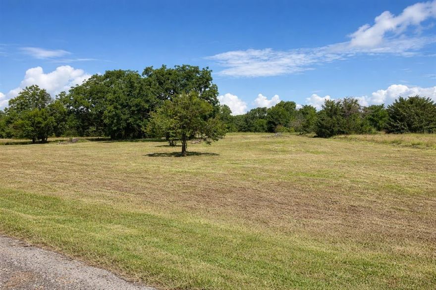 Build your dream getaway on this beautiful 1 acre lot located in the sought after Chambers Point community in Kerens, Texas. Perfectly positioned for lake living, this property offers the ideal setting for a custom home, weekend retreat, or investment opportunity. Enjoy beautiful lake views and the added benefit of access to a private community boat ramp, giving you convenient entry to the water for fishing, boating, and endless days of outdoor fun. With plenty of space to design the home and outdoor setup you have always wanted, this lot combines privacy, convenience, and recreation all in one. Whether you are looking for a peaceful escape or the perfect place to build near the lake, this 1 acre lot offers endless possibilities in a great location with the scenic views buyers dream of.