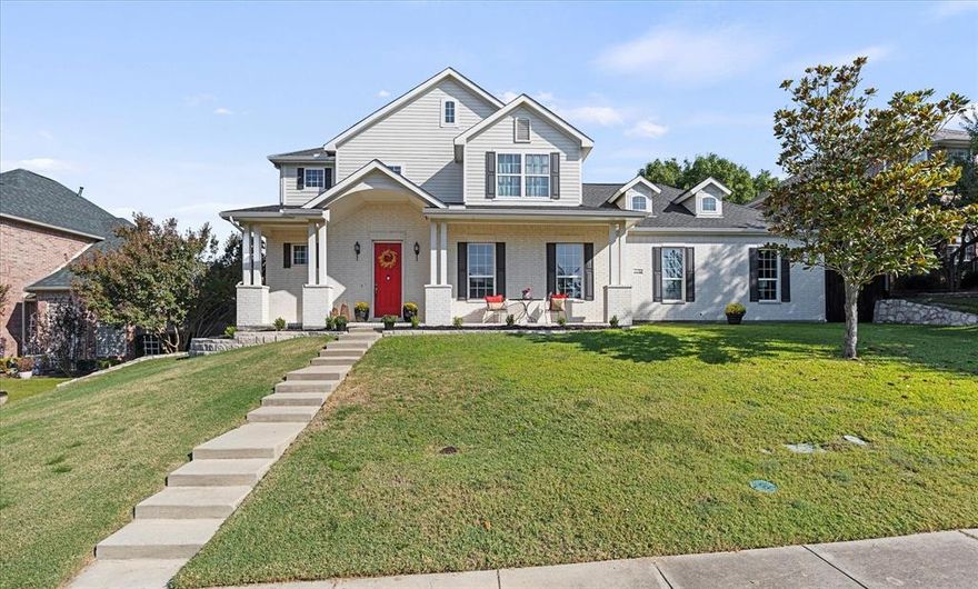 NO HOA!  Tucked away on a quiet cul-de-sac near the shores of  Lake Ray Hubbard, this stunning 5 bedroom, 6 bath  located in The Pinnacle offers resort-style living and endless flexibility. The open-concept kitchen, dining, and living area features expansive windows that flood the space with natural light and capture tranquil backyard views and relaxation vibes! Downstairs, you’ll find primary bedroom, laundry room, built in workstation and  three versatile flex rooms—perfect for a home office, gym, craft room, or additional guest space—giving you the freedom to tailor the home to your lifestyle. Upstairs, discover three spacious bedrooms, each with its own charm, plus a large game room or family room area with built in entertainment center that provides extra space for playing your favorite game, watching a movie or having fun. Lake views offer a view of downtown Dallas, from the upstairs family room. Step outside to your private backyard oasis, complete with a sparkling pool with cascading waterfall, spa, and outdoor living center with a cozy stone fireplace—ideal for year-round entertaining.  There is parking in alley behind the home. Located just minutes from major roadways, Downtown Rockwall,  The Shores Golf Club, Lake Ray Hubbard, parks, shopping and dining, this home perfectly blends comfort, convenience, and versatility.