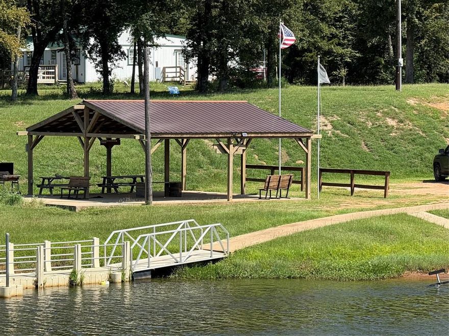 This is a terrific location in the gated lakefront community of Holiday Villages of Lake Fork. These two oversized lots back up to a beautiful open area with trees and access to an inlet  at the creek at Lake Fork. On lot 382 there is an oversized RV cover, which is 24 x 30… Perfect to bring your motorhome or fifth wheel. Utilities are already in place with septic, electric and water. The entire lot is fenced and gated. Features a private boat ramp and fishing dock, as well as some wonderful community amenities. There’s a wonderful pool, sport court and clubhouse for the homeowners to enjoy.