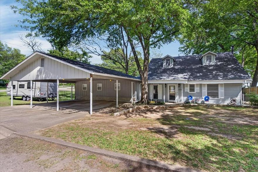 Enjoy lakefront living in this 3-bedroom, 2-bath home located in the quiet Tradewinds Addition community on Cedar Creek Lake. This property offers a private boat slip, a spacious waterfront entertaining area, additional storage, a cozy wood-burning stove, outdoor firepit, and covered parking with attached storage. The home features an open-concept living and dining area with large windows that showcase beautiful lake views. The dining area comfortably seats six and flows seamlessly into the living room, creating the perfect space for gathering with family and friends. The primary bedroom and one bathroom are located upstairs, along with an additional bedroom. Downstairs you’ll find a third bedroom and second bathroom, offering flexibility for guests or family. Step outside to the covered back patio, ideal for relaxing and enjoying the peaceful surroundings. The fenced yard  provides plenty of room for entertaining, outdoor activities, or letting pets run freely. Located at the end of a quiet cove, the property offers scenic water views and a tranquil setting.This is an excellent opportunity to own a lakefront home on Cedar Creek Lake at an attractive price, with a voluntary POA. The surrounding area continues to grow with new restaurants, shops, and local hangouts nearby. Conveniently located just one hour from Dallas, this property is perfect as a full-time residence, weekend getaway, or investment opportunity.If you’ve been looking for a lake home on Cedar Creek Lake, this could be the one! 24 hour showing request required.Home is located in TVEC Co-op and WCCMUD district.