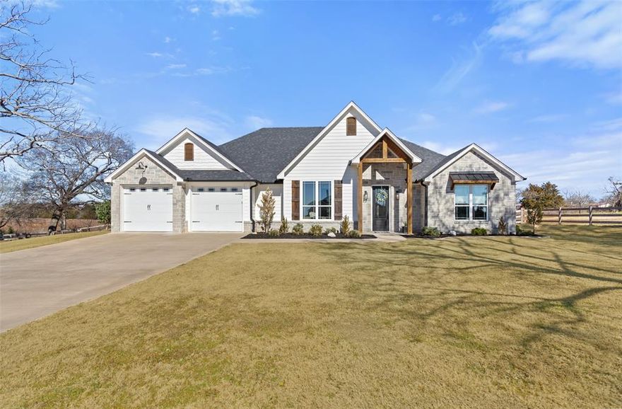 Experience custom craftsmanship and resort-style living in this stunning 4-bedroom, 3-bath home set on over half an acre with sweeping sunset views. Thoughtfully designed, every bedroom features a walk-in closet, and one secondary suite includes its own private en suite bath — perfect for guests or multigenerational living. Step outside to your private backyard retreat featuring a custom-designed, in-ground pool complete with programmable equipment, ozone filtration, pebble tech plaster upgrade, brand new Looplock pool cover, removable child safety fence, and remote LED lighting. Entertain year-round beneath the gazebo beside a custom outdoor fireplace, all overlooking a serene equestrian pasture where deer frequently roam and sunsets steal the show. Inside, the home showcases a fully custom interior with designer fixtures and striking etched concrete floors that blend durability with modern style. Energy-efficient upgrades include spray foam insulation, a tankless water heater, recent roof replacement, and drought-tolerant landscaping for low-maintenance living. A custom split-rail fence frames the property, enhancing its charm while preserving the open countryside feel. This home is a rare blend of luxury design, energy efficiency, and peaceful outdoor living — a true sanctuary just minutes from town.