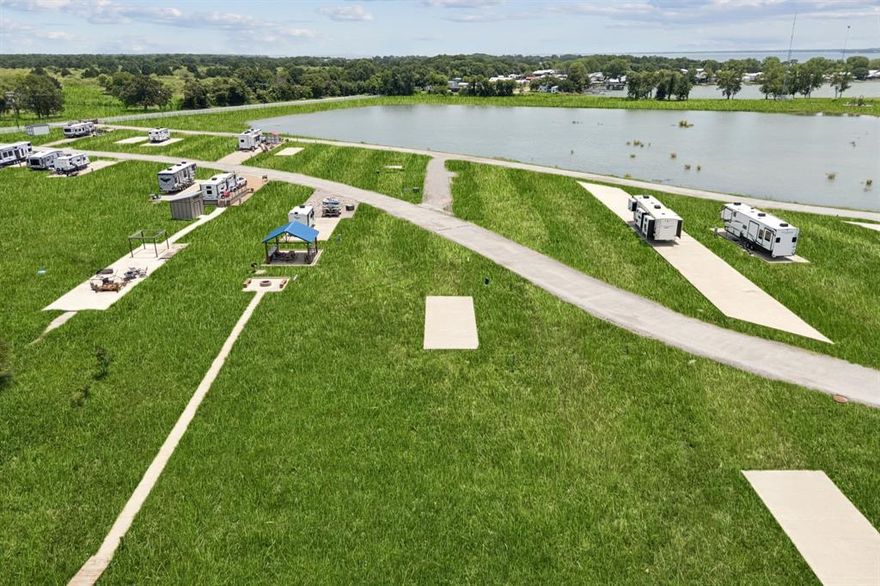 A beautiful waterfront lot in the exclusive open water subdivision on Richland Chambers Reservoir! Gated and secured entrance, enjoy and escape to the peaceful retreat to enjoy the weekends and holidays.  Bring your RV or Tiny Home and welcome to Peninsula Point to enjoy the amenities of a clubhouse, lovely crystal clear community pool, convenient laundry room, outdoor grill area, playground, dog park. Peninsula Point has a mandatory $91 water fee monthly, 
Lawn Maintenance: $25 (Owner must opt out if not maintaining their own land) Storage is 30.00, if available, 50.00 rental, owner must opt out if not renting.
Please refer to the parcel number for Lot 15 and legal description.  Buyer and Buyers agent to verify all information and measurements.  Please verify all information before submitting offers, and call listing agent for any questions. Seller Concessions up to 5K for closing cost.