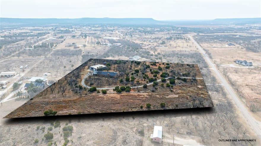 Amazing one of a kind, updated home, custom built shop and 8.9 acres in Wylie East Schools! Beautiful home with open floor plan, 3 bedrooms and 3 full baths! Kitchen boasts granite counter tops, large island, SS appliances and updated cabinets all open to large living area with brick fireplace. Many windows make it light and bright! French doors to the outside patio off of the dining area. Split bedroom arrangement with large primary bedroom on one side of the home. Barn door in primary bedroom opens to a luxury bath area with double sinks, amazing tile shower and large walk-in closet. 2 bedrooms on the other side of the home with double sinks in the guest bath for added functionality! Also large laundry room with sink and abundant  storage throughout the home inside and out! Enjoy endless spring and summer evenings in the large screened in back porch with views of Steamboat Mountain and gorgeous sunsets! 8.9 acres, partially fenced for all your outside needs. 60X40 metal shop with 8' by 60' covered shipping container storage and a 60' by 20' awning with full concrete slab, totaling 2880 sq. ft. closed cell spray foam insulated shop storage and 1680 sq. ft. of covered outdoor storage in the structure. 4 roll up doors! Ask about other features of the shop ready to go! Additional spray foam insulated 1 car garage and 2 car plus carport attached to the house. Lower taxes outside the city limits. Must see property!